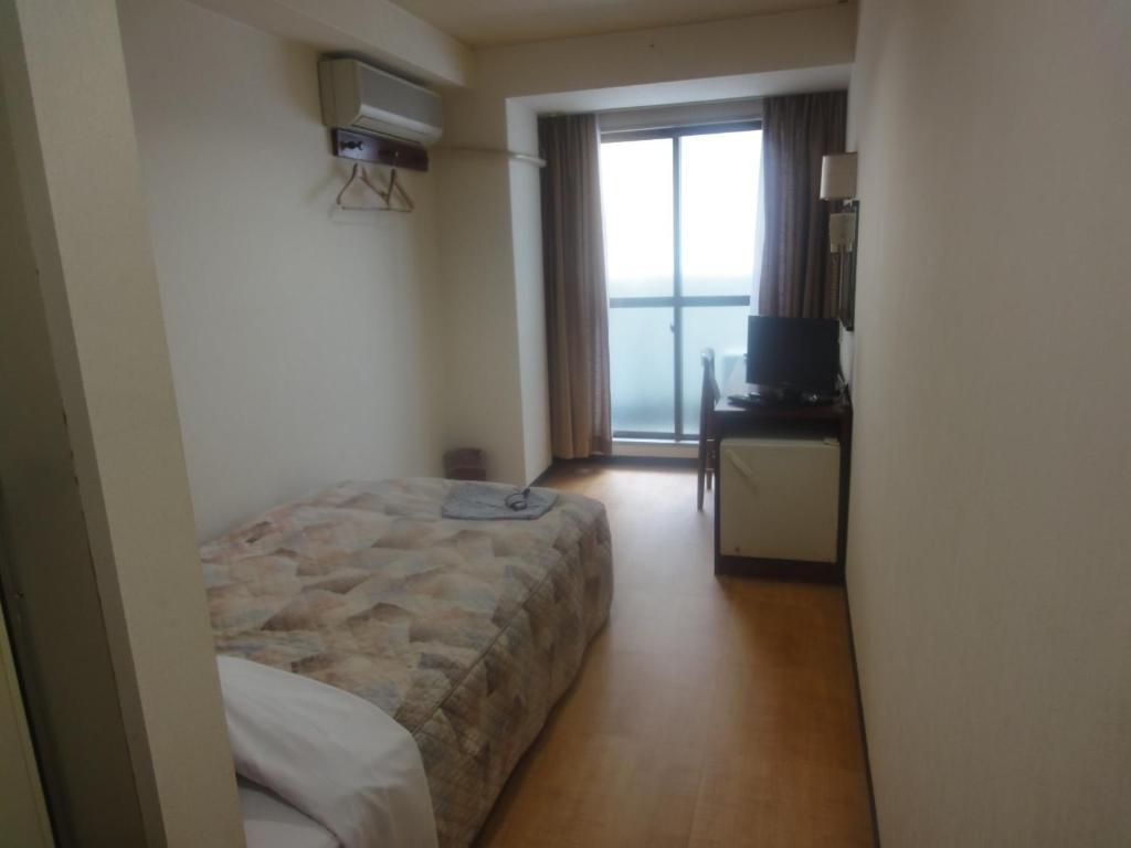 Million City Business Hotel Hiroshima Quarto foto